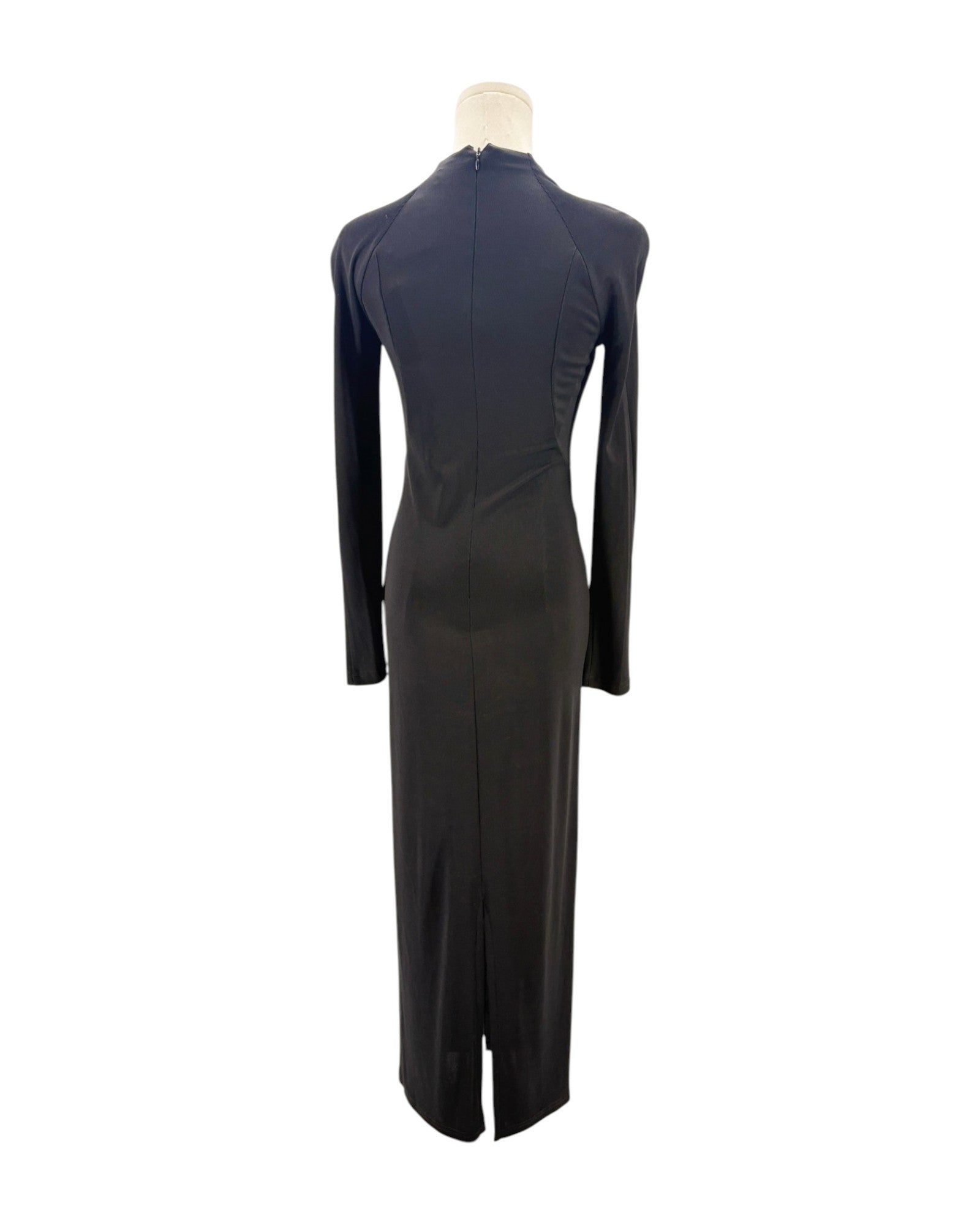 Black dress on a mannequin against a white background