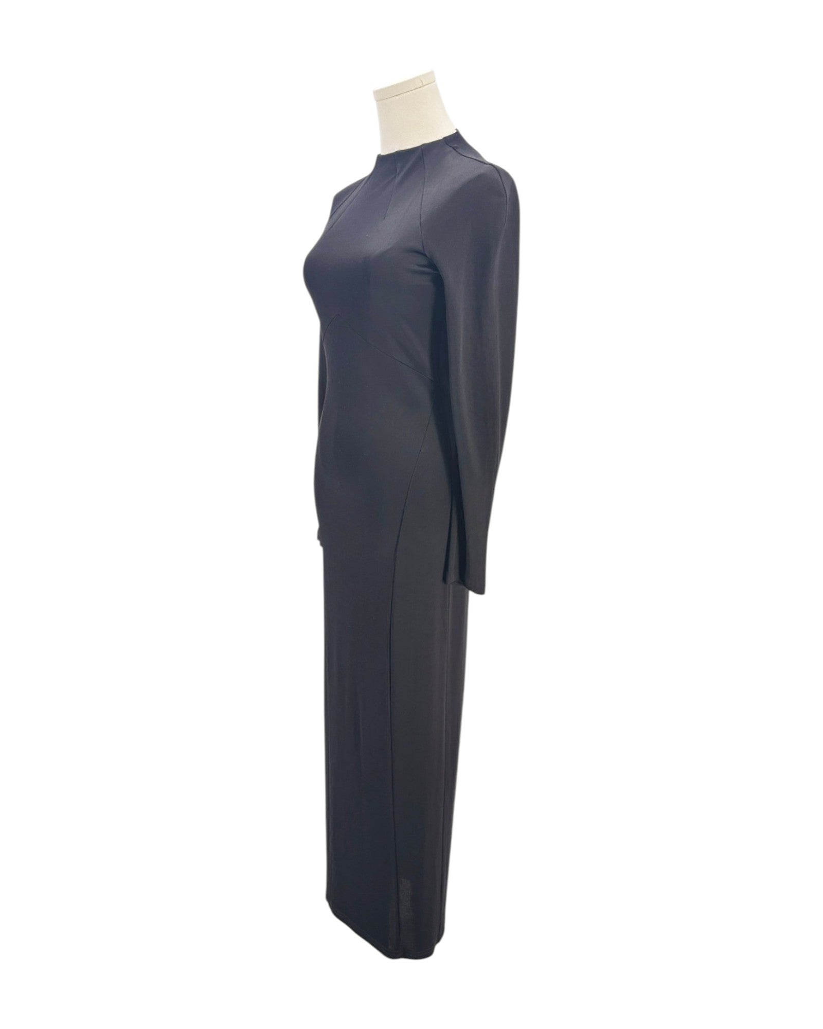 Black dress on a mannequin against a white background
