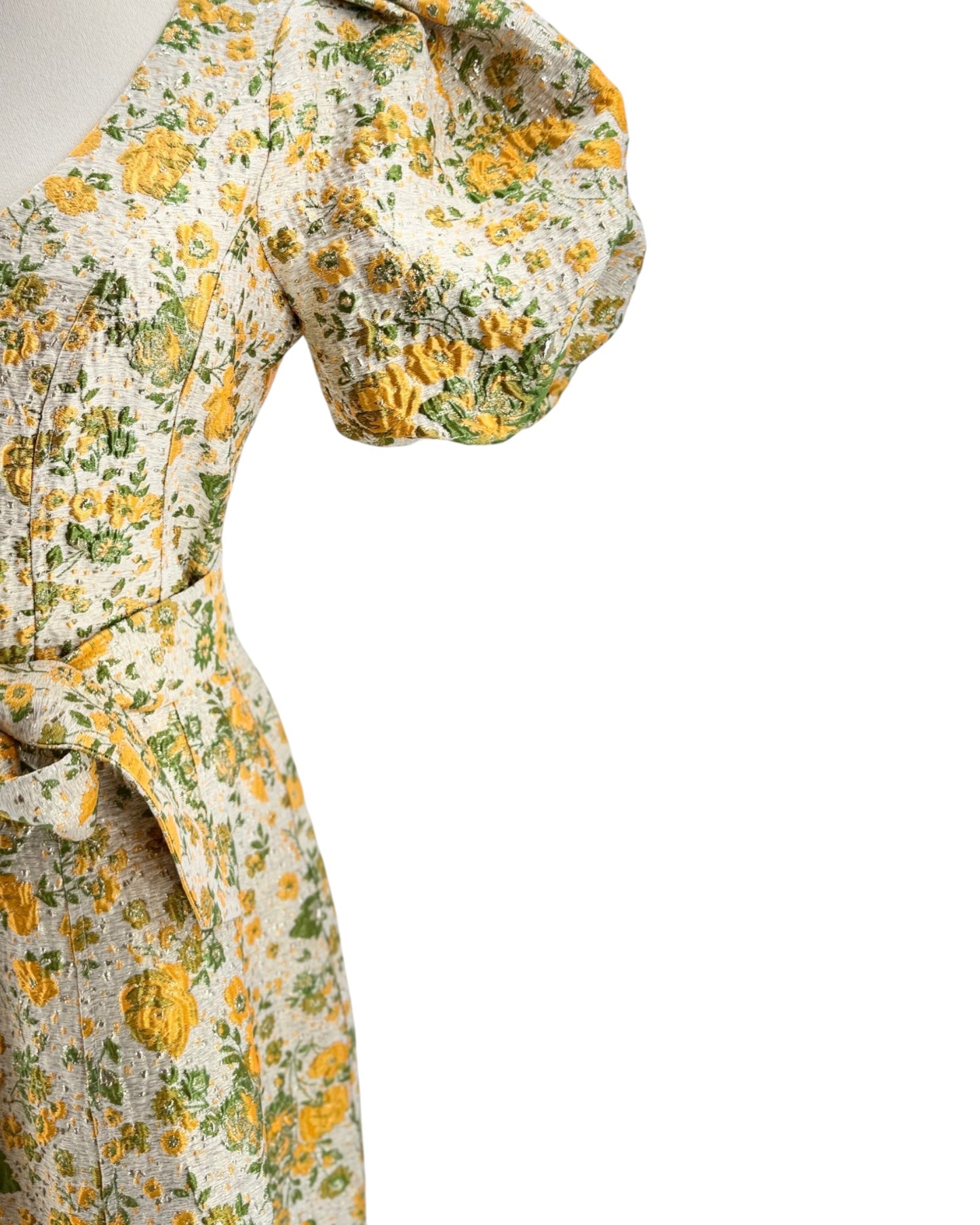 Floral-patterned outfit on a mannequin against a white background