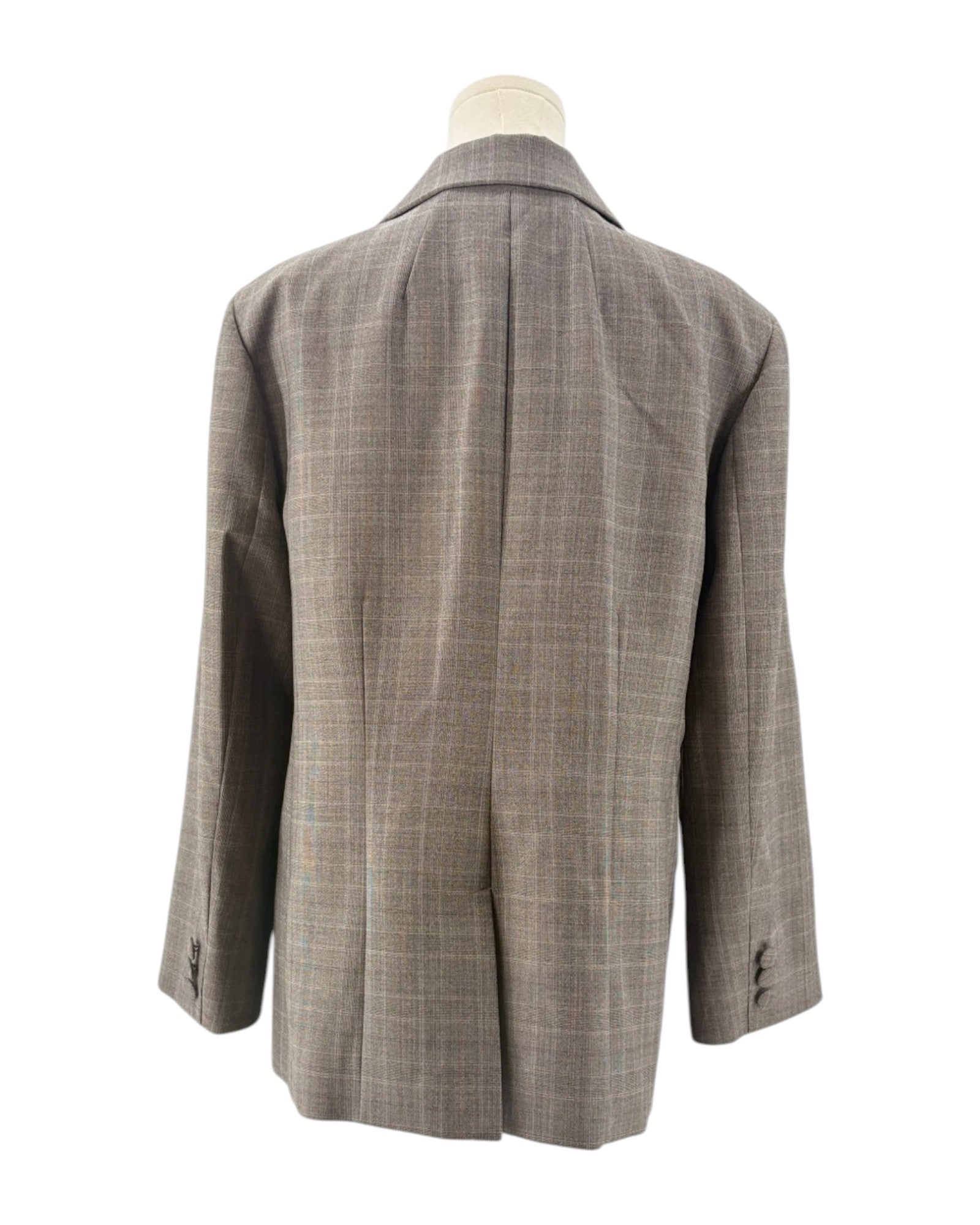 Frame gray checkered blazer on a mannequin against a white background