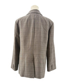 Frame gray checkered blazer on a mannequin against a white background