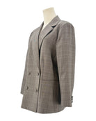 Frame gray checkered blazer on a mannequin against a white background