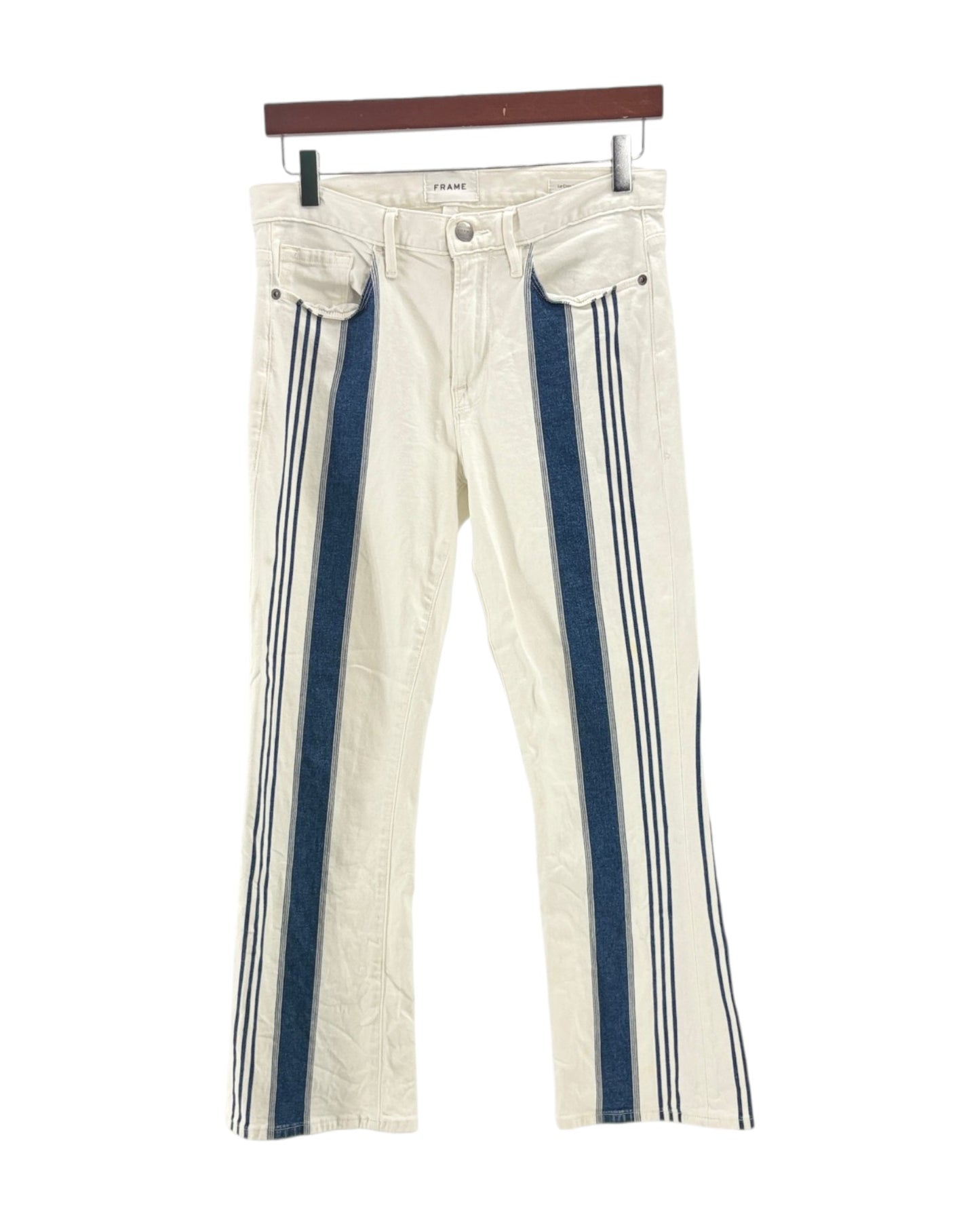 White pants with blue stripes on a hanger against a white background