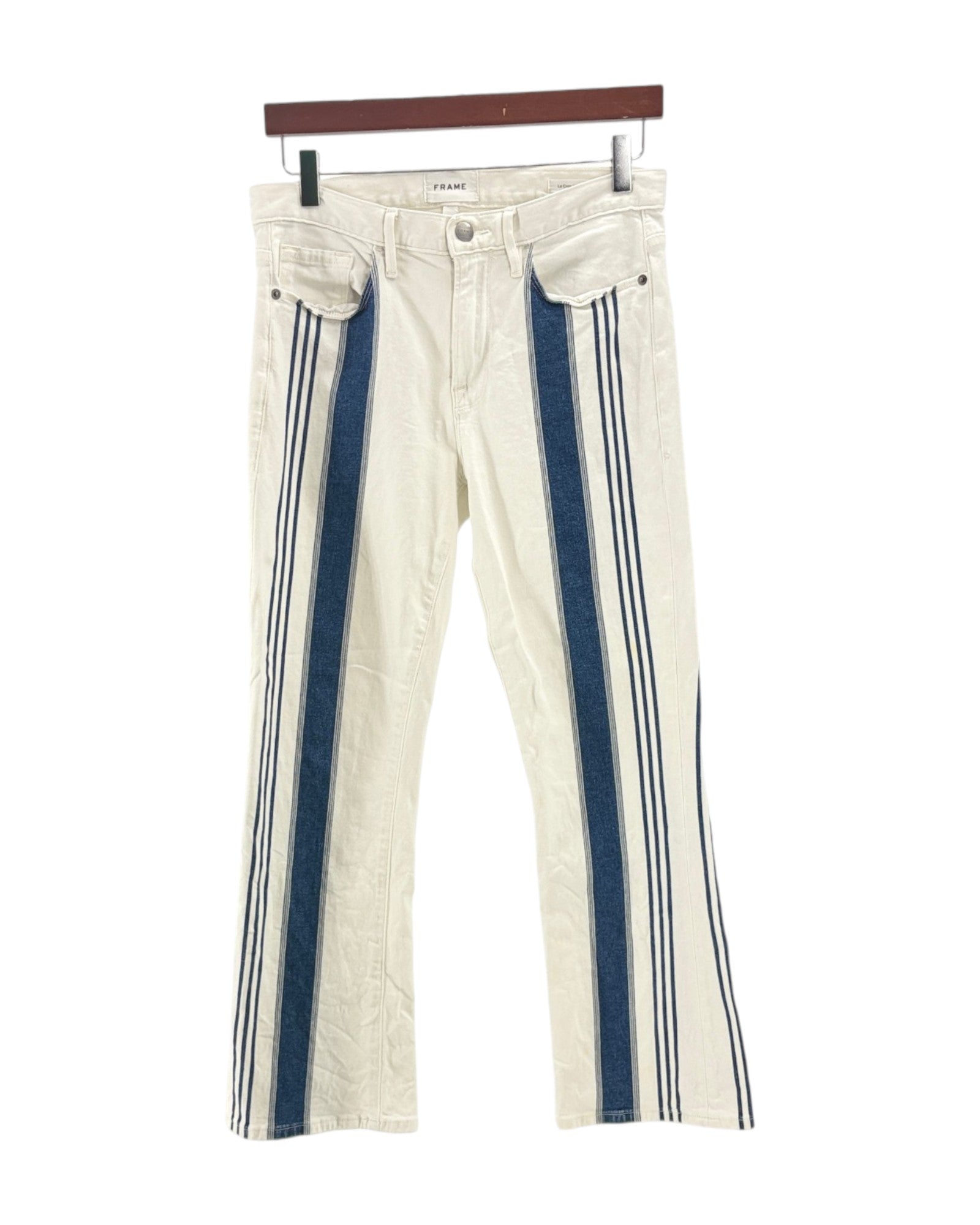 White pants with blue stripes on a hanger against a white background