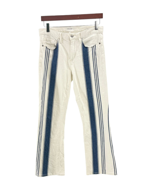 White pants with blue stripes on a hanger against a white background