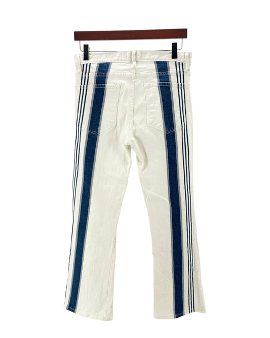 White pants with blue stripes on a hanger against a white background