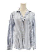 Striped shirt on a mannequin against a white background