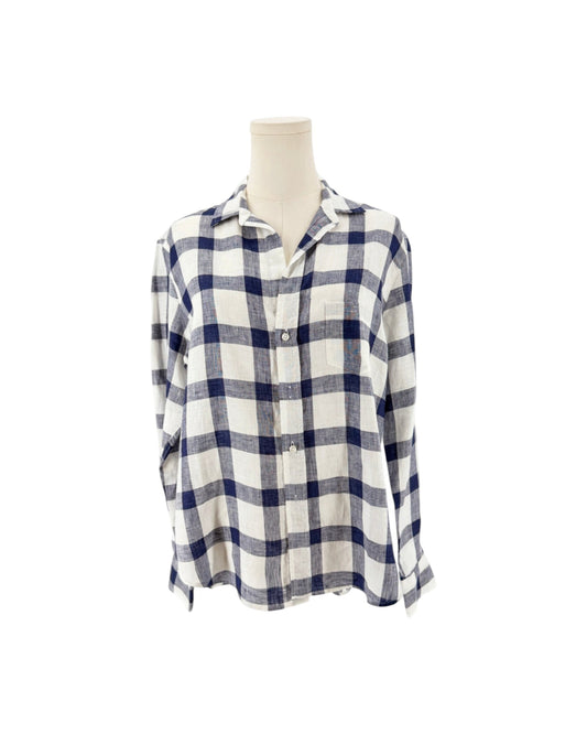 Blue and white button up, relaxed fit, chest pocket, flattering button placement with long sleeves, and button cuffs on a mannequin on a white background