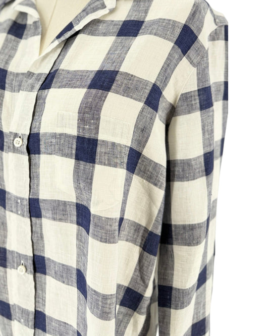 Blue and white button up, relaxed fit, chest pocket, flattering button placement with long sleeves, and button cuffs on a mannequin on a white background