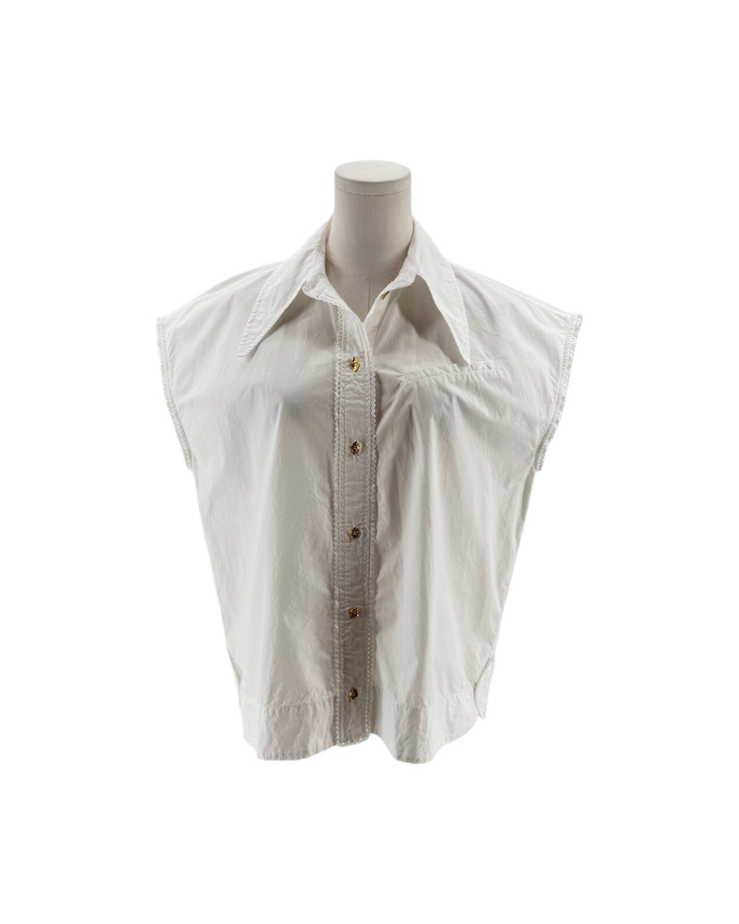 White sleeveless shirt on a mannequin against a white background