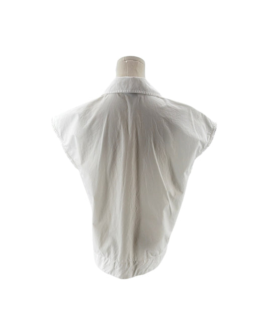 White shirt on a mannequin against a white background