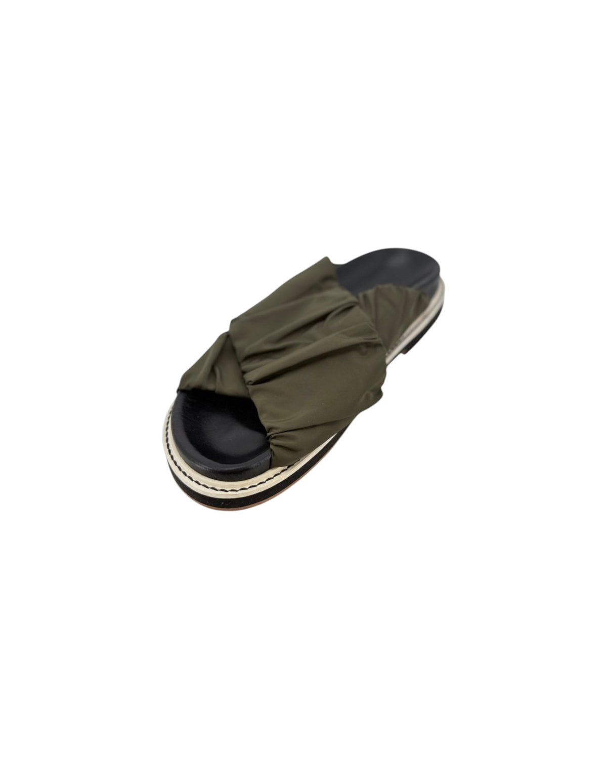 Black slip on sandals with two thick green straps across the top on a white background