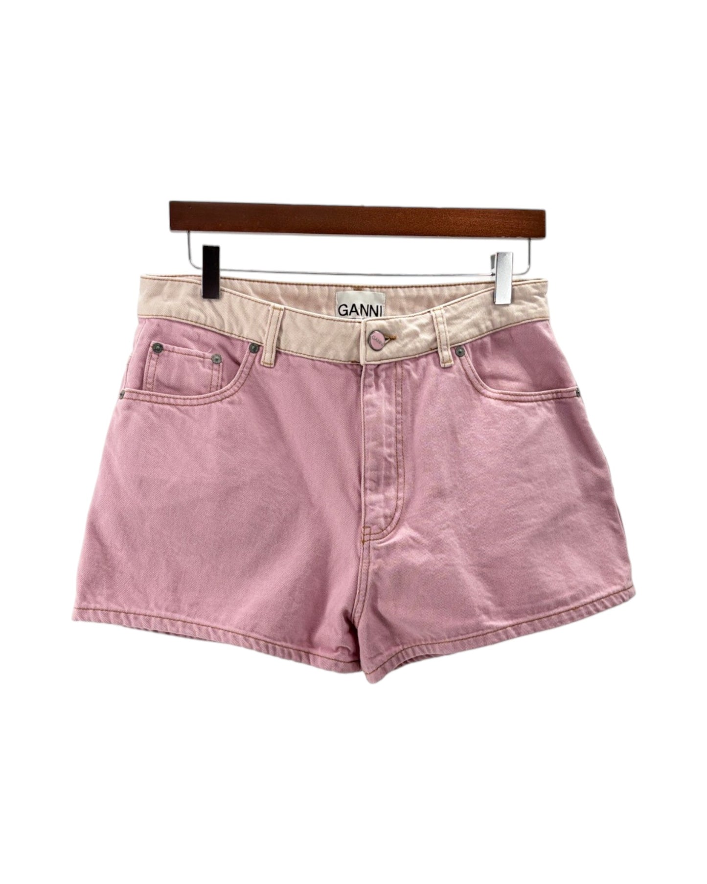 Pink denim shorts on a white bacground