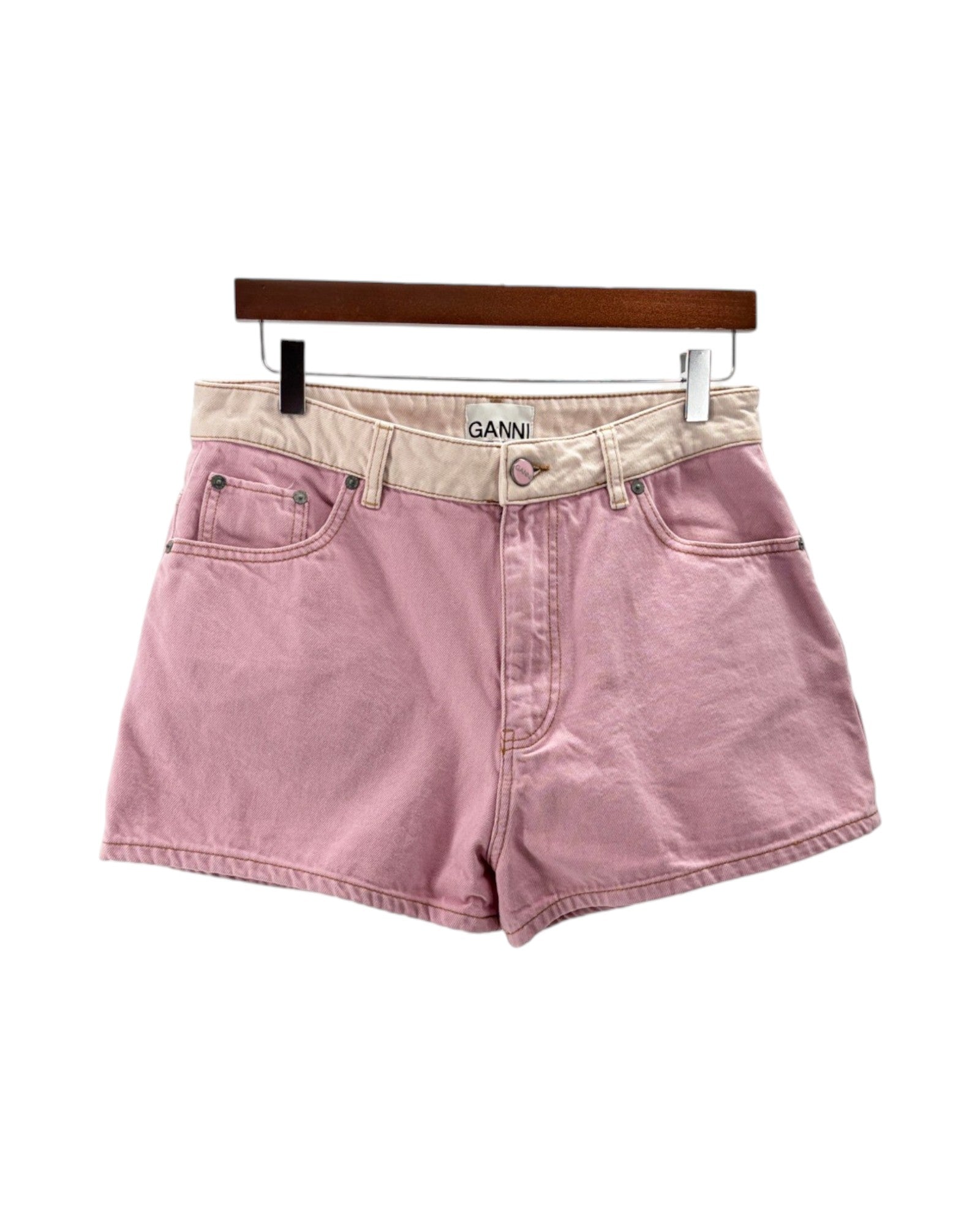Pink denim shorts on a white bacground