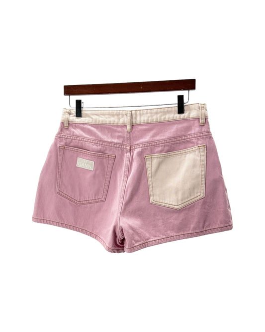 Pink denim shorts on a white bacground