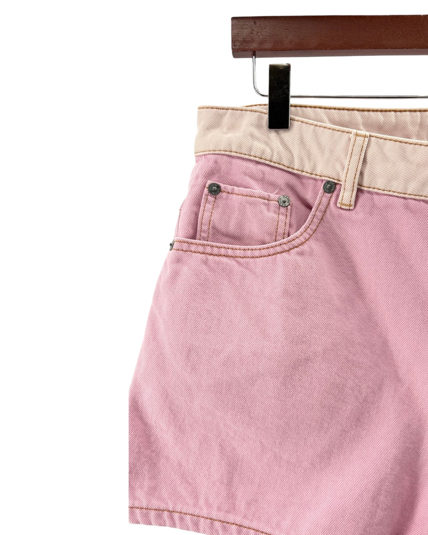 Pink denim shorts on a white bacground