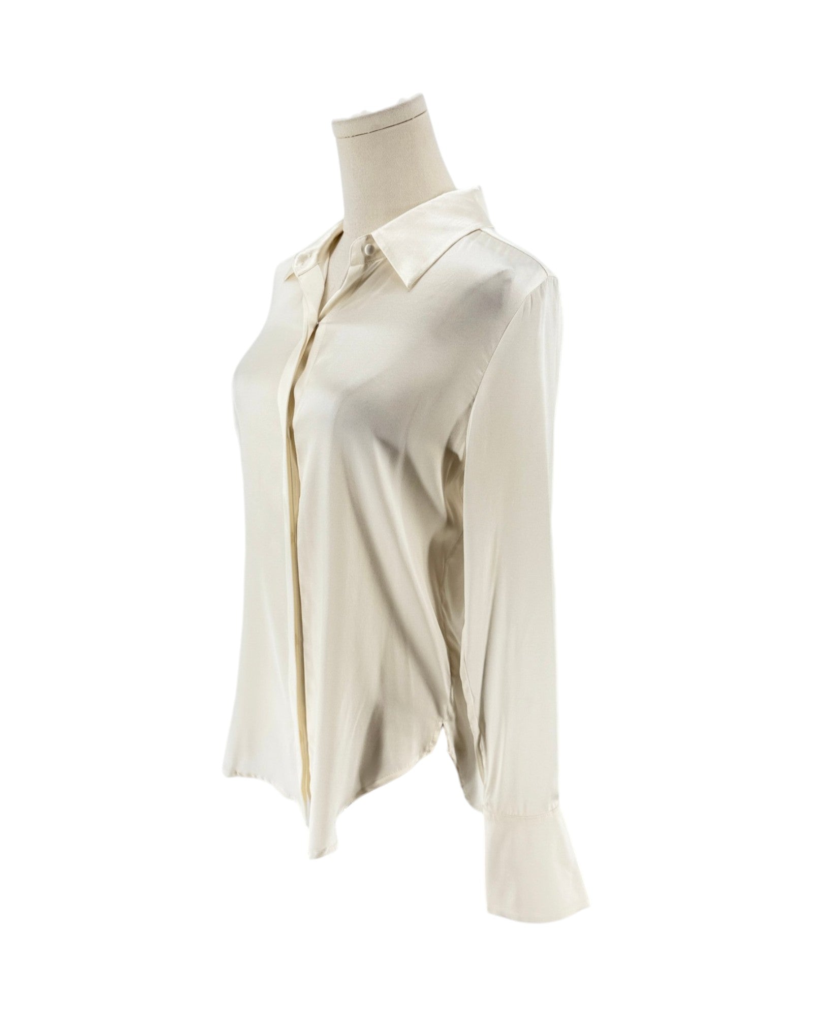 An off-white long-sleeve button-up shirt displayed on a mannequin torso against a plain white background.