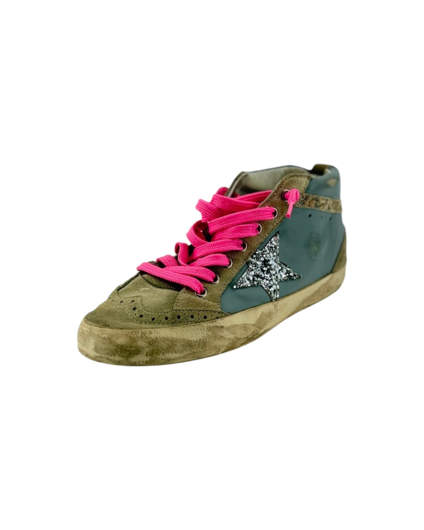 sneaker with pink laces and a decorative star on a white background