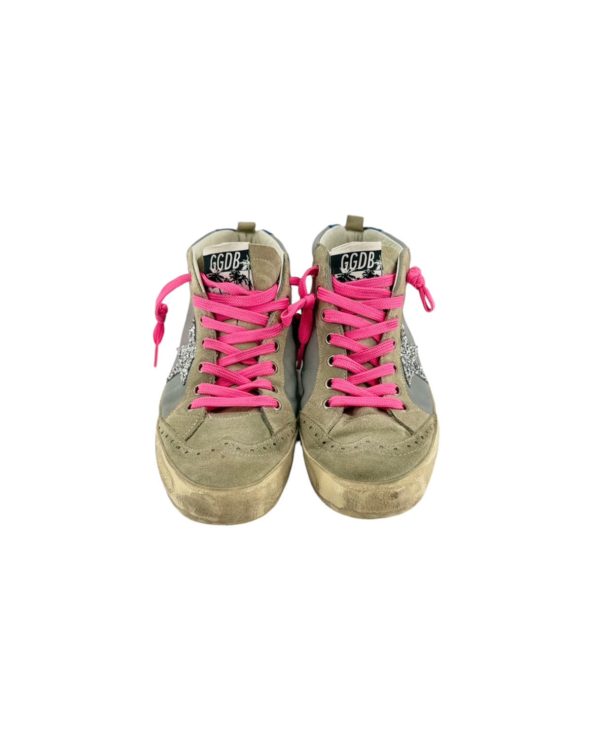 Grey suede mid rose sneakers with silver glitter star logo, neon pink laces, weathered midsole, blue and white golden goose heel logo on a white background