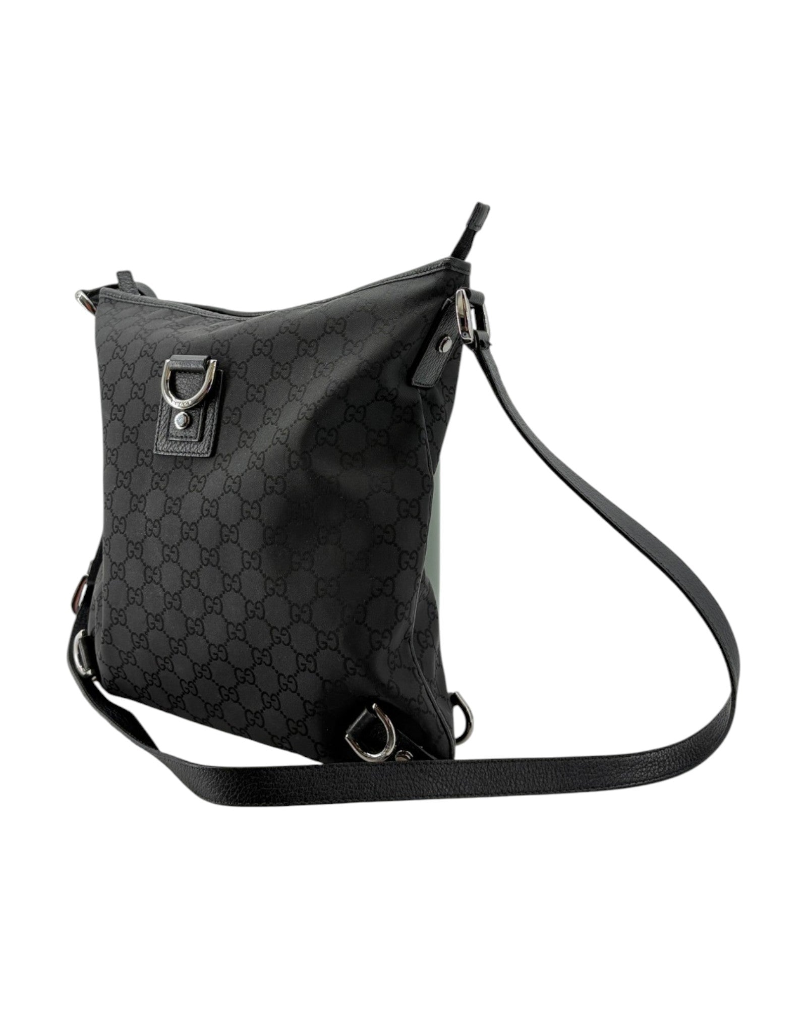 Black patterned shoulder bag on a white background