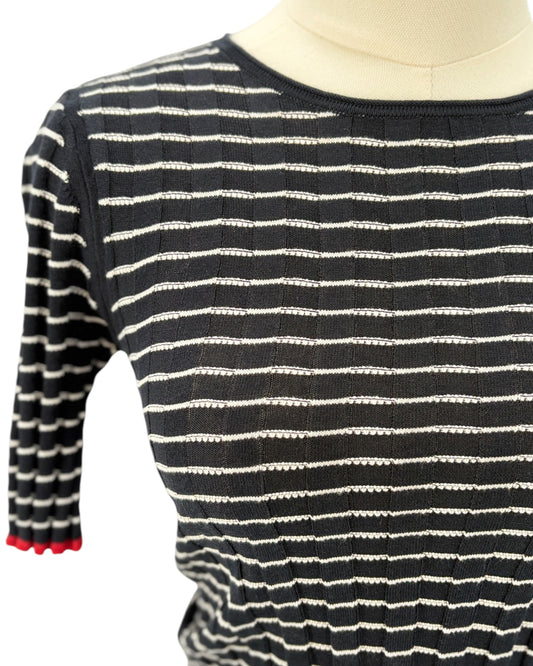 Guest in Residence black and white striped sweater on a mannequin with a white background