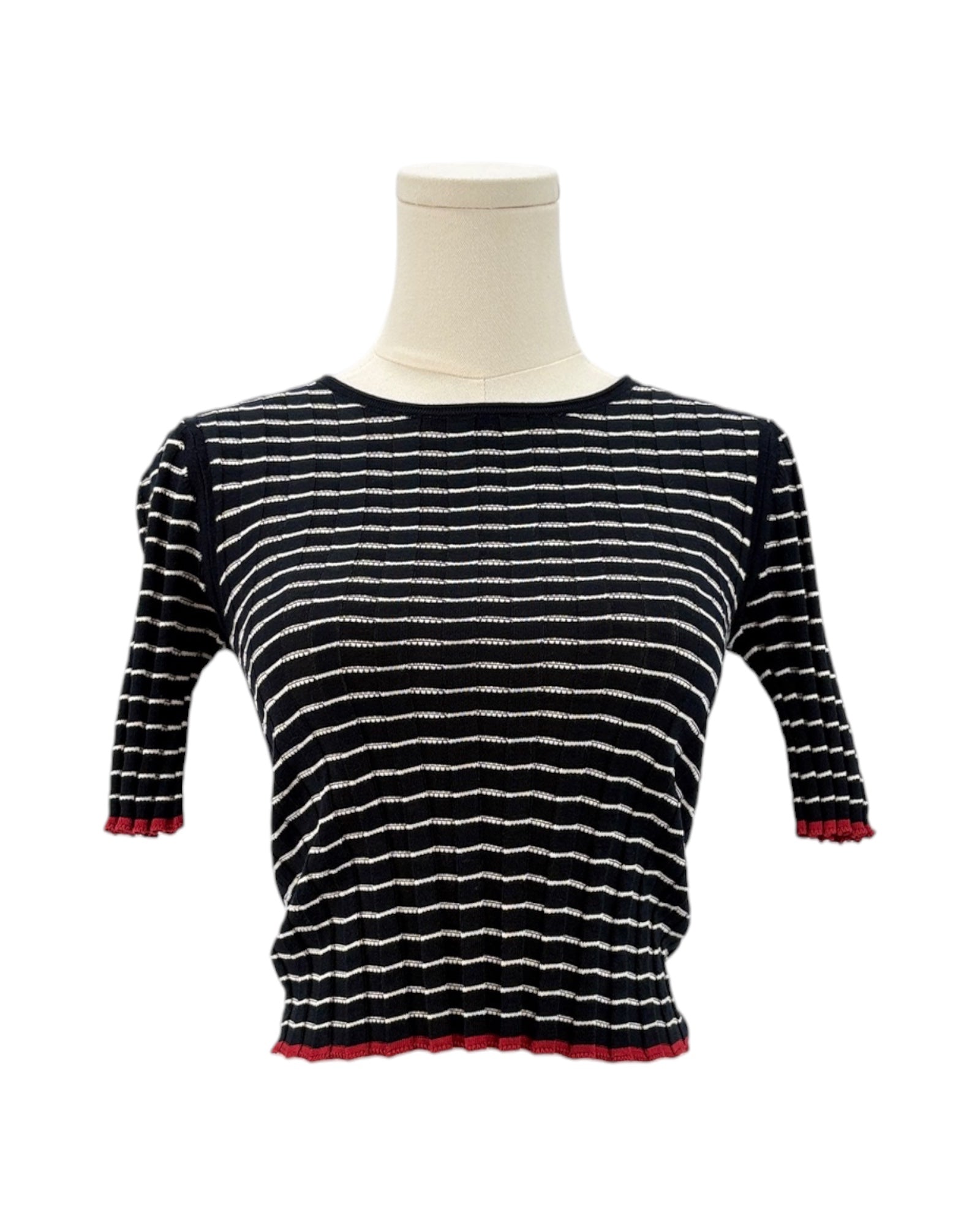 Guest in Residence black and white striped sweater on a mannequin with a white background