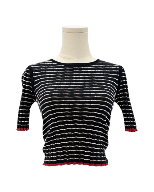 Guest in Residence black and white striped sweater on a mannequin with a white background