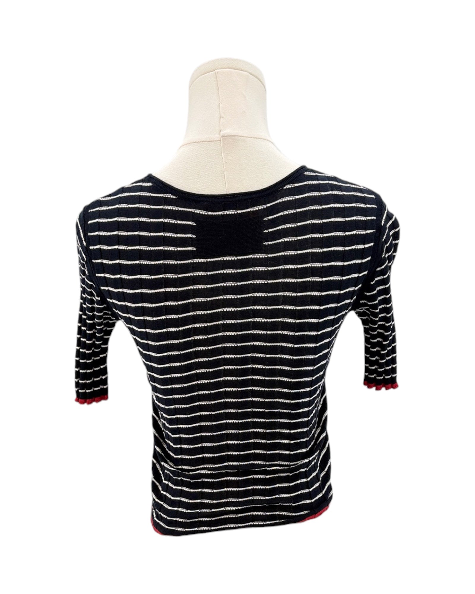 Guest in Residence black and white striped sweater on a mannequin with a white background
