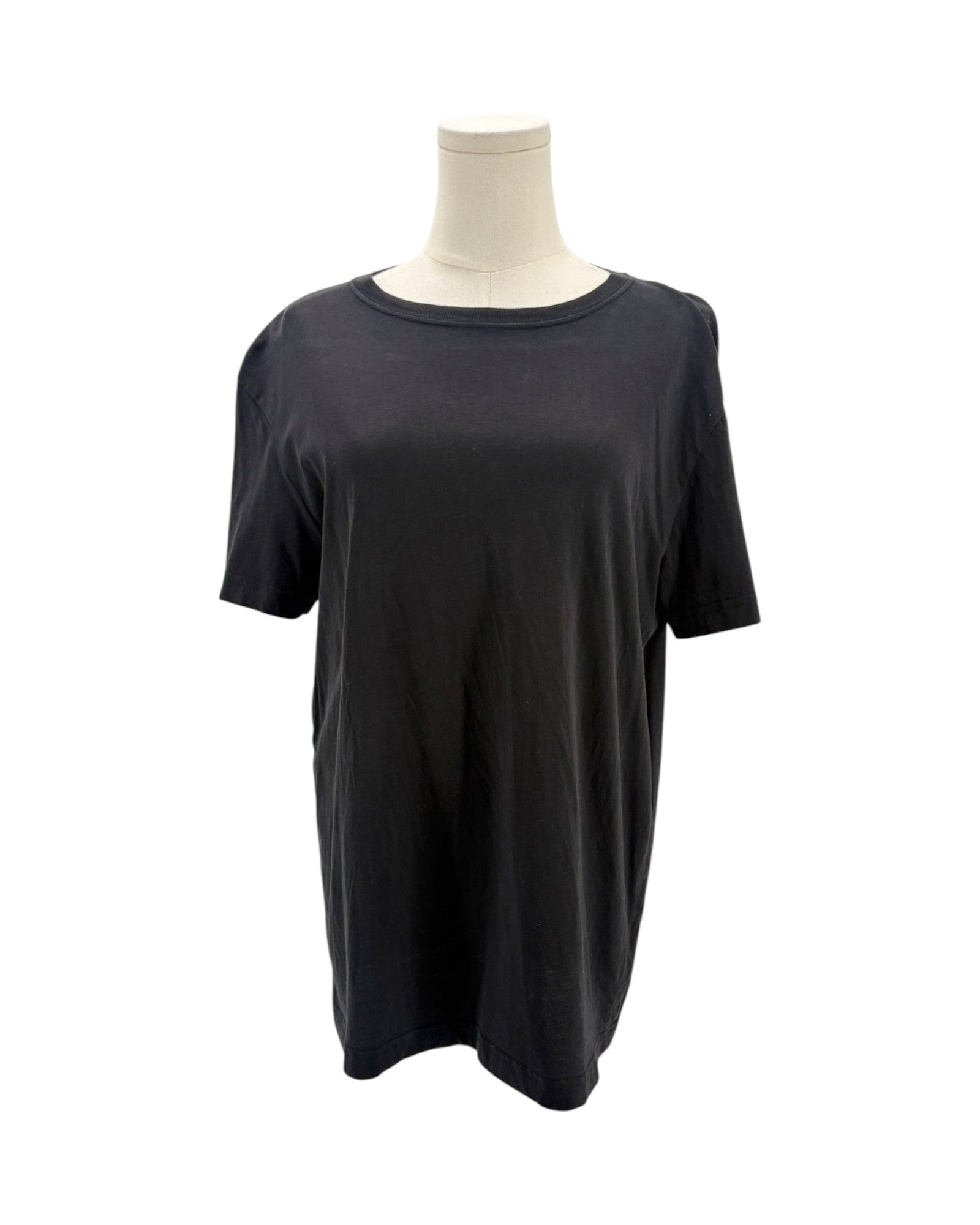 Black t-shirt on a mannequin against a white background