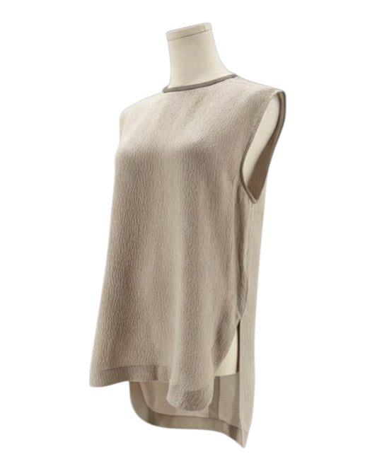 Helmut Lang beige sleeveless top on a mannequin with a white background