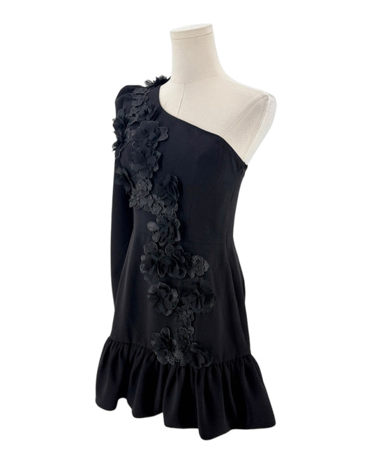 Black mini dress with only one long sleeve with black floral applique on one side