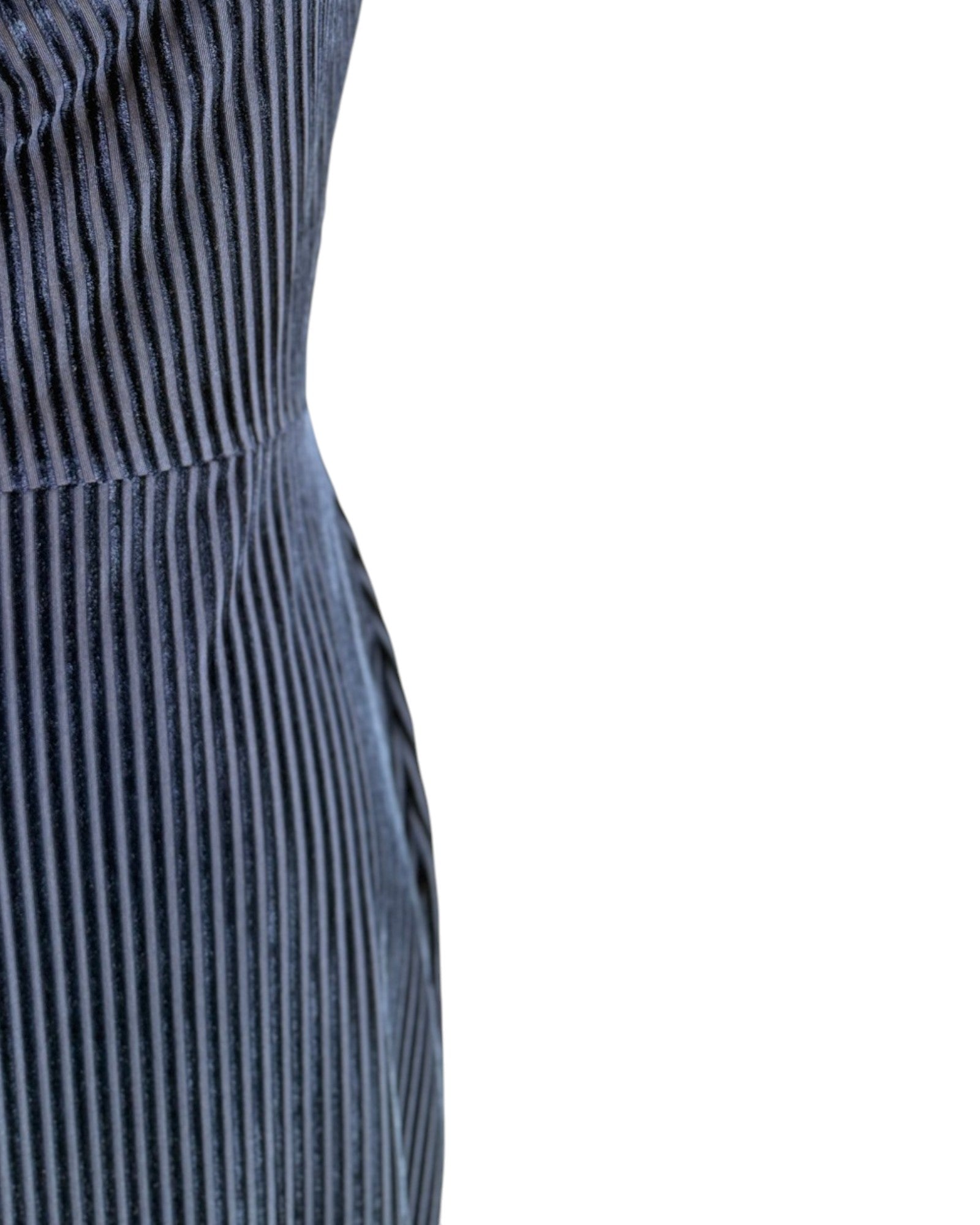 Close-up of a ribbed blue dress on a white background