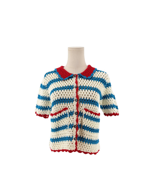 Blue white and red short sleeve, front patch pockets, button front, vertical striped print, peter pan style collar cardigan sweater on a white background on a mannequin