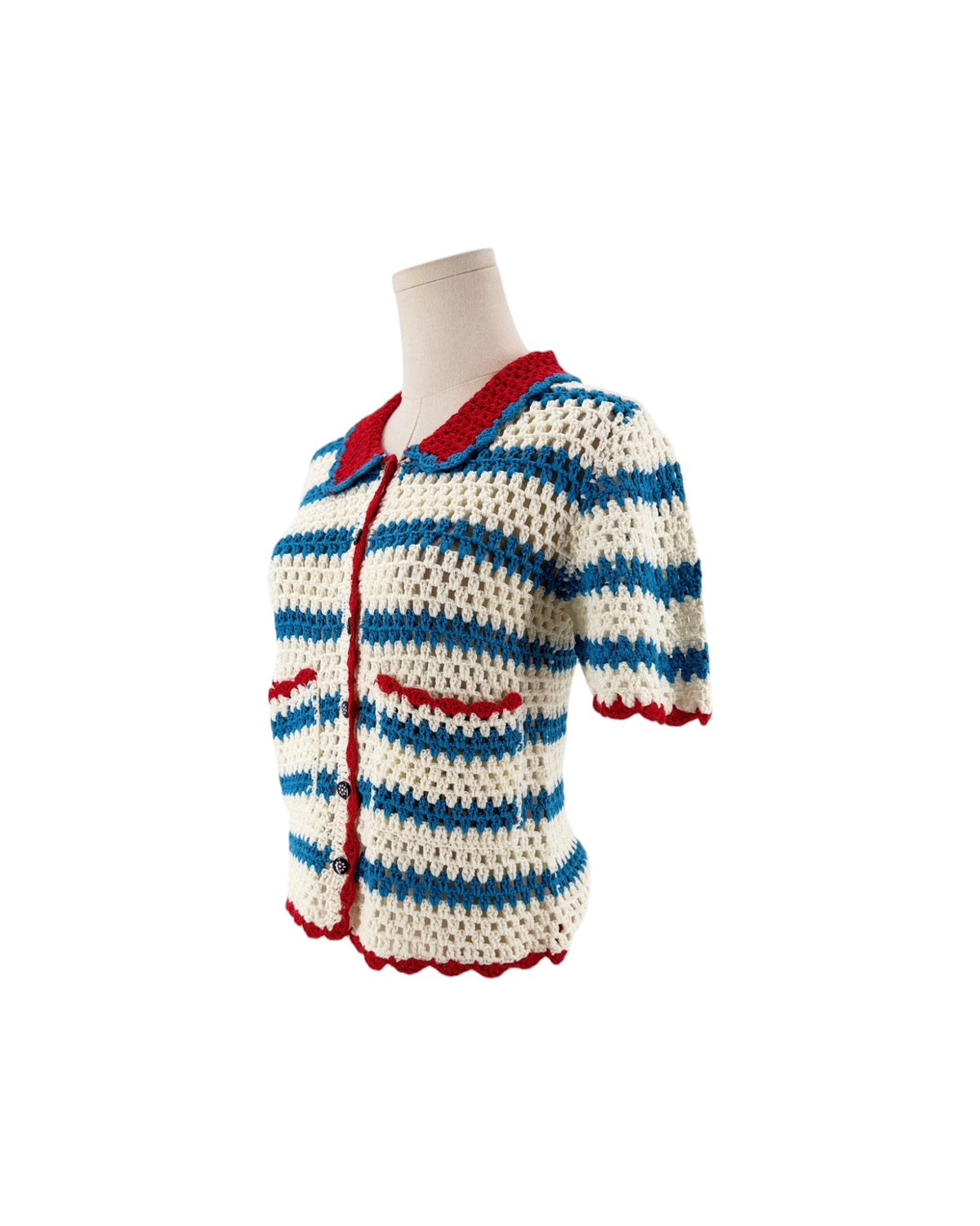 Blue white and red short sleeve, front patch pockets, button front, vertical striped print, peter pan style collar cardigan sweater on a white background on a mannequin