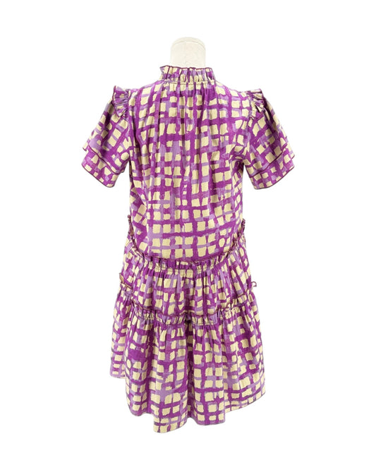 Purple and cream checkered dress on a mannequin against a white background