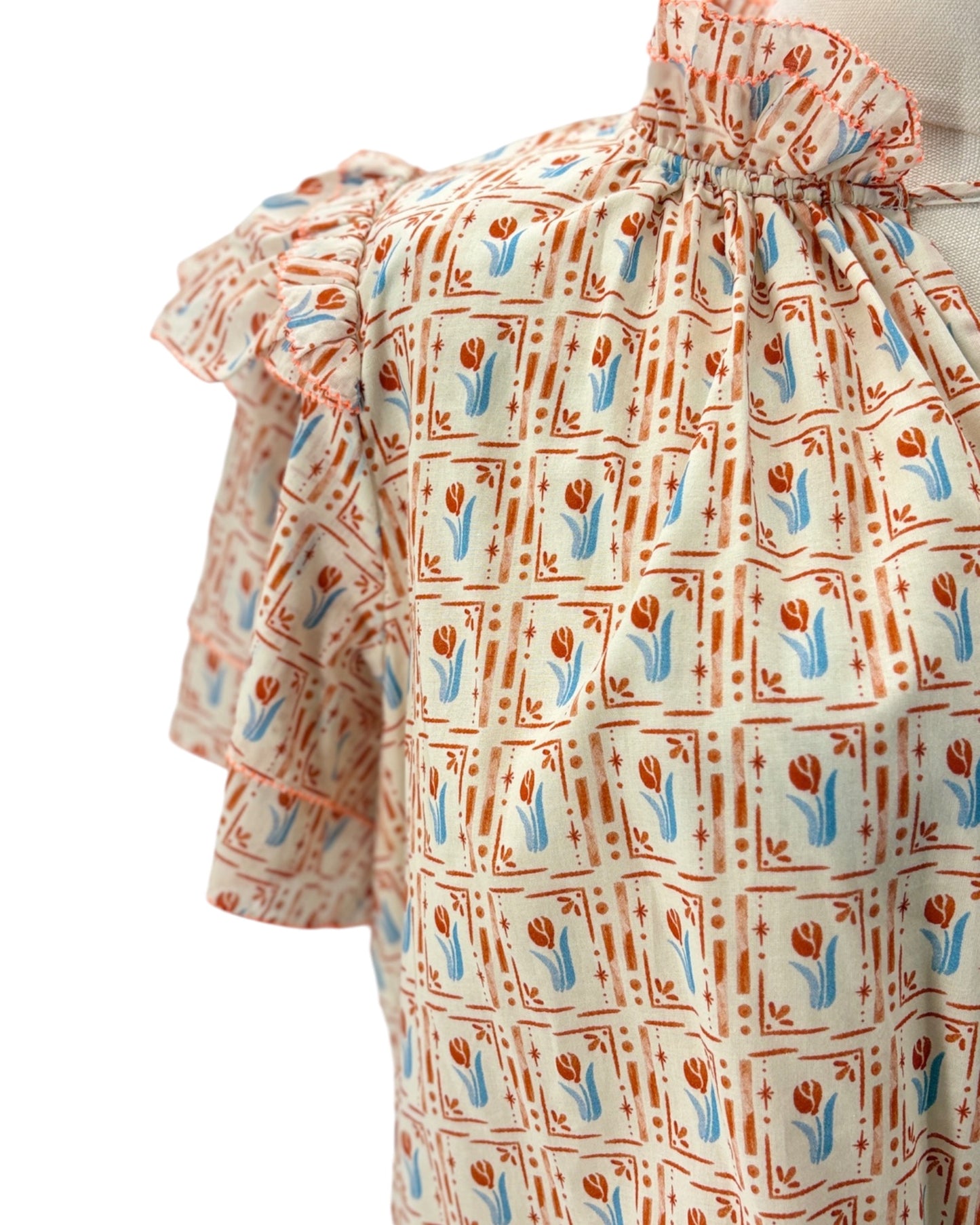 Floral patterned dress with a white background