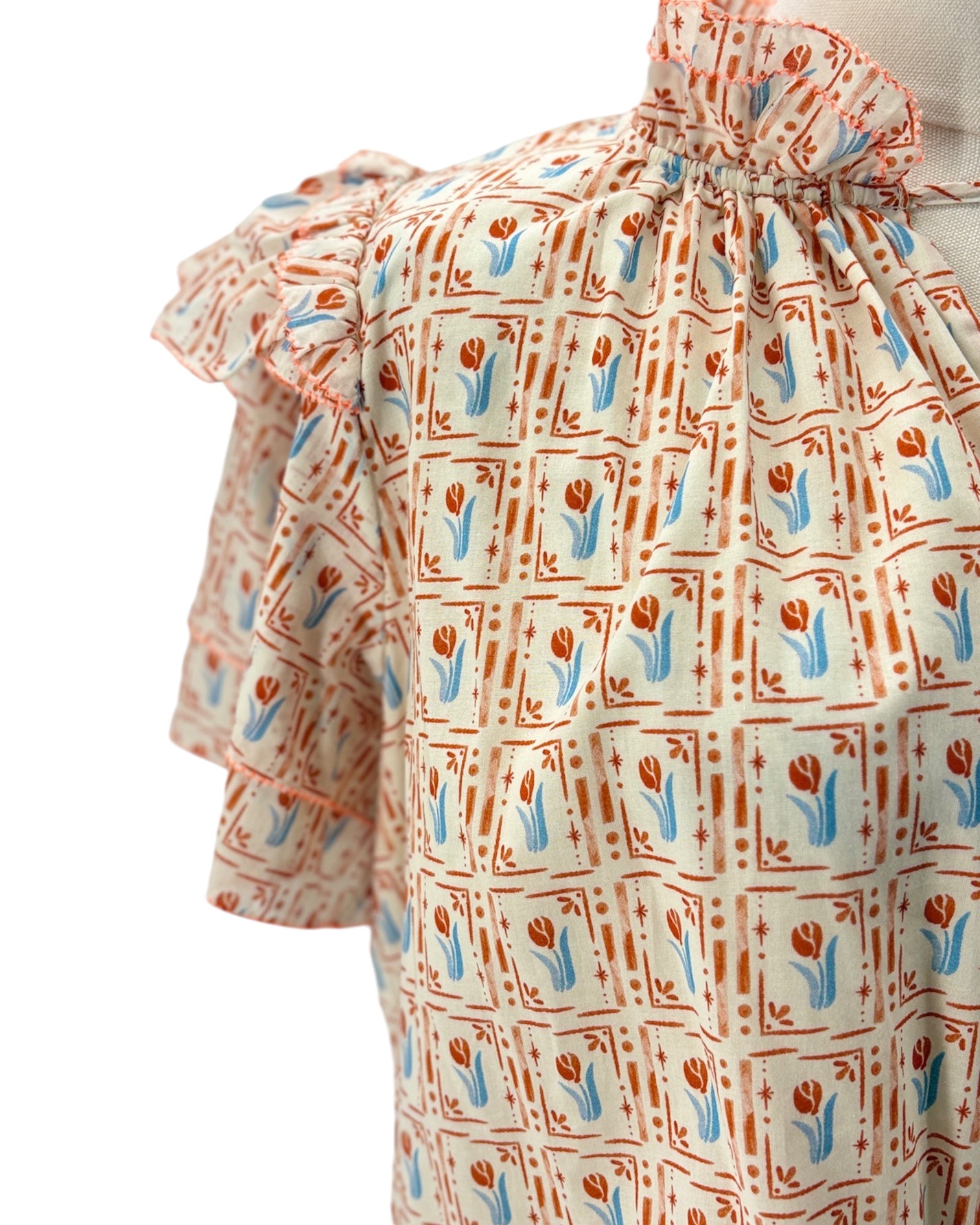 Floral patterned dress with a white background