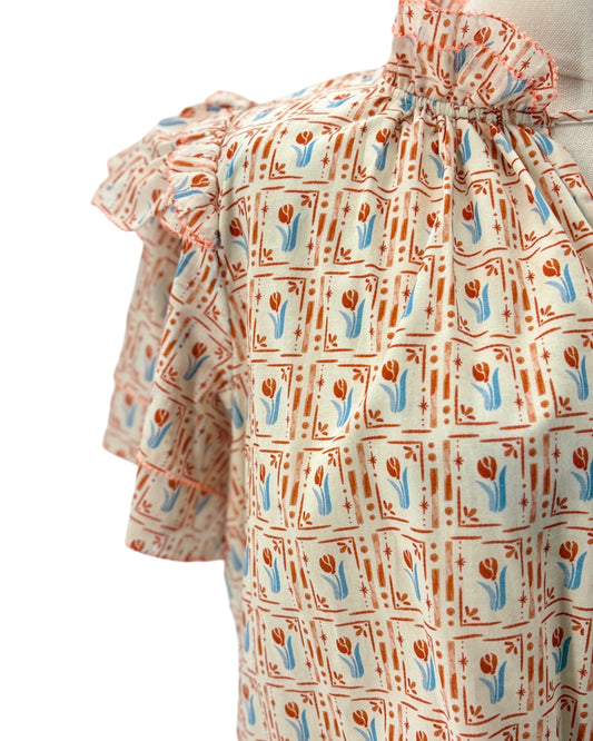 Floral patterned dress with a white background
