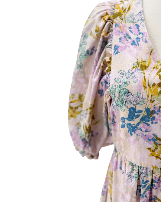 Floral dress with pastel colors on a white background