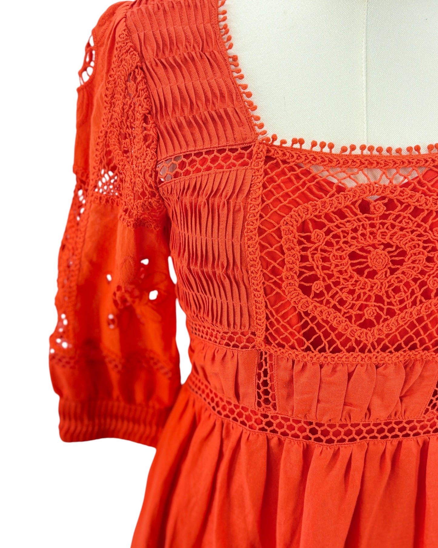 Hunter Bell orange dress with intricate patterns