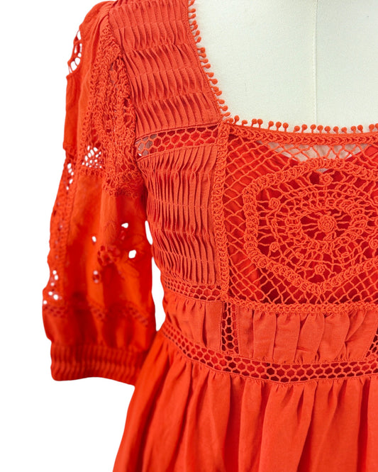 Hunter Bell orange dress with intricate patterns