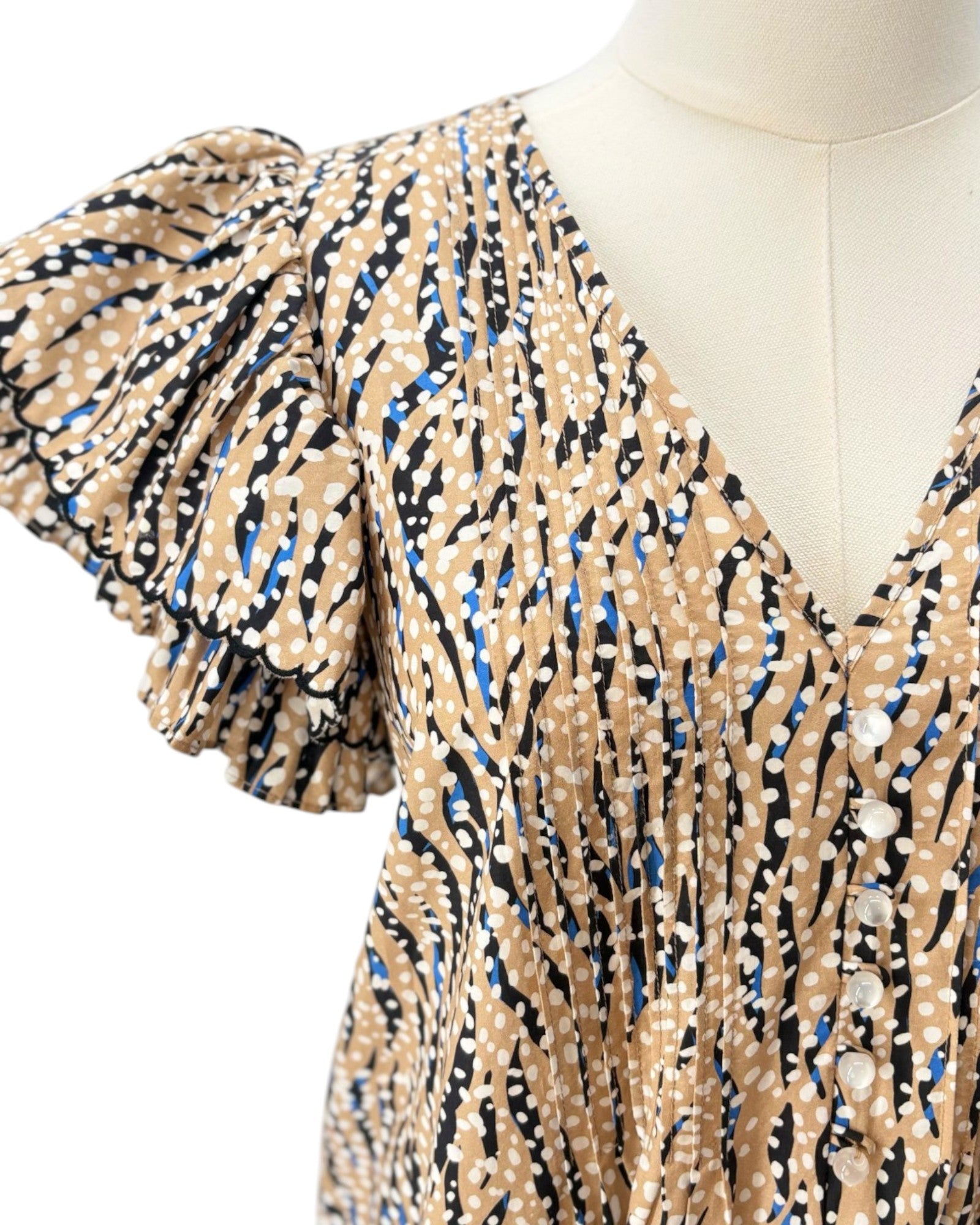 Hunter Bell patterned dress on a mannequin against a white background