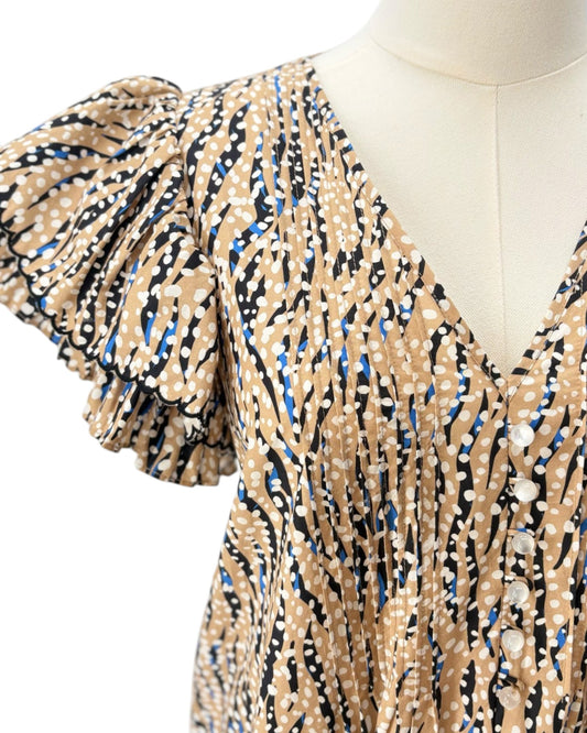 Hunter Bell patterned dress on a mannequin against a white background