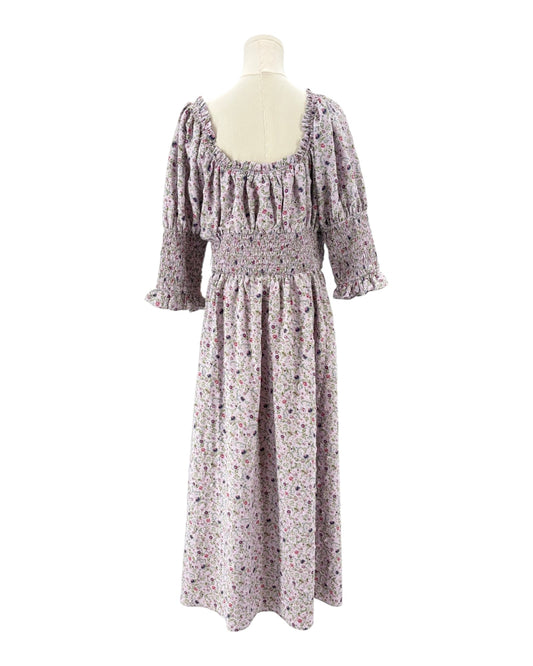 Hyacinth House floral dress on a mannequin against a white background