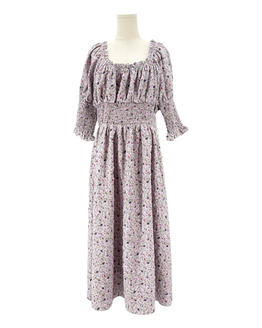 Hyacinth House floral dress on a mannequin against a white background