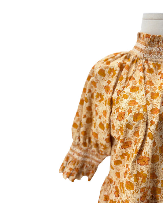 Floral dress with puffed sleeves on a white background