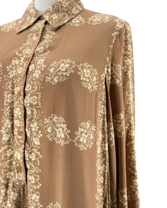Tan and cream floral long sleeve Maxi dress with button down front and collar on a mannequin on a white background