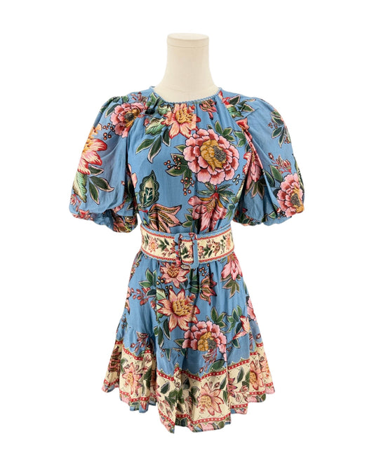 A blue floral print dress with puff sleeves and a matching belt, displayed on a mannequin torso against a white background.