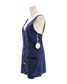 Blue dress on a mannequin with a white background