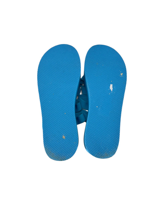 A pair of bright blue textured flip-flop sandals shown from a top-down view on a plain white background.